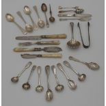 A SILVER SUGAR SIFTING SPOON AND A QUANTITY OF SILVER SPOONS, KNIVES AND FORK (24)