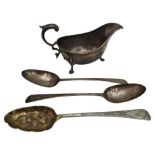 A PAIR OF GEORGE III SILVER SERVING SPOONS, A GEORGE III REPOUSSE SERVING SPOON AND A 1930'S