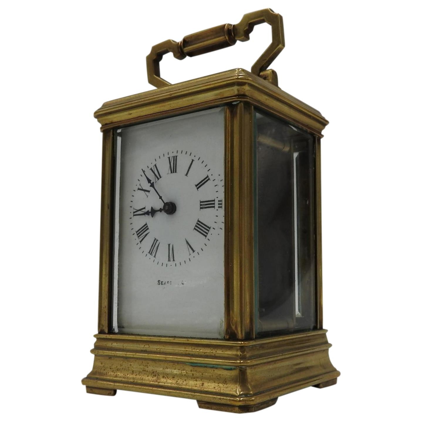 A FRENCH BRASS CASED CARRIAGE CLOCK, 12 x 8 x 7.5cm