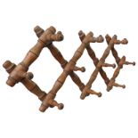 A 19TH CENTURY BAMBOO STYLE FOLDING CUP RACK