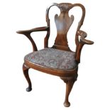 A 19TH CENTURY MAHOGANY ELBOW CHAIR, the shaped central splat with carved shell decoration, with