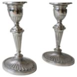 A PAIR OF DANISH STERLING SILVER CANDLESTICKS, Grecian tapered fluted design on oval bases,