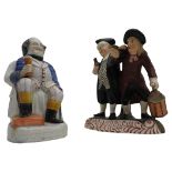 TWO 19TH CENTURY TAVERN FIGURES, one seated pearl ware figure with tankard and figure of two