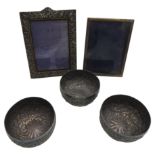 THREE INDIAN SILVER BOWLS AND TWO SILVER PICTURE FRAMES