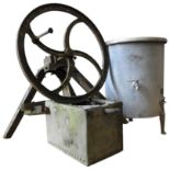 A CAST-IRON GRINDING WHEEL, GALVANISED RIVETTED PLANTER AND A VERSCO GALVANISED WATER BOILER, the