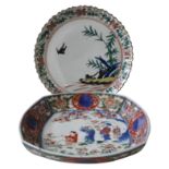 JAPANESE 18th CENTURY RECTANGULAR DISH IN IMARI STYLE, restored, and a Japanese plate sparsely