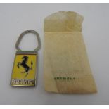 FERRARI KEYRING (NO FOB) IN WAXED PAPER PACKET  Rare 1960s Ferrari item, new/old stock and still