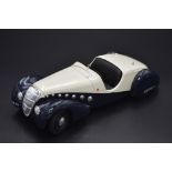 1:18 1937 PEUGEOT 302 DARL MAT SPIDER BY NOREV This die-cast model is finished in Blue/Cream, fitted