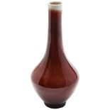 FLAMBE-GLAZE BOTTLE VASE LATE QING DYNASTY the sides covered in a rich raspberry-red glaze