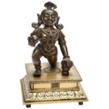 BRONZE FIGURE OF AN INFANT KRISHNA INDIA, 19TH CENTURY the figure shown kneeling, raised on a