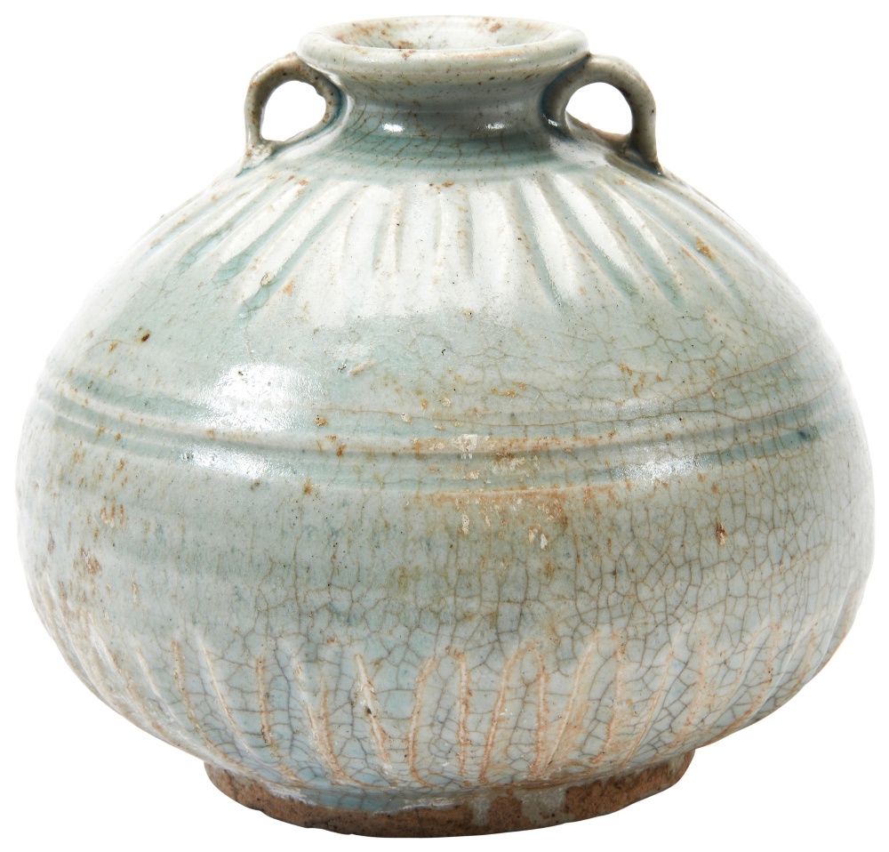 CELADON-GLAZED JAR SONG DYNASTY (960-1279) the squat baluster sides carved with a band vertical