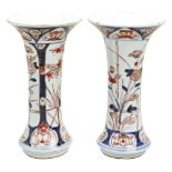 PAIR OF JAPANESE IMARI TRUMPET VASES  EDO PERIOD, 18TH CENTURY the side decorated with verdant