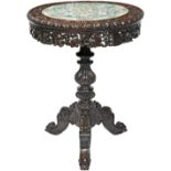 GOOD HUALI-WOOD CARVED AND FAMILLE VERTE PORCELAIN MOUNTED TRIPOD TABLE QING DYNASTY, 19TH CENTURY