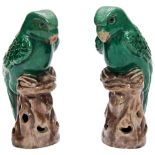 PAIR OF CHINESE GREEN-GLAZE PARROTS  QING DYNASTY, 19TH CENTURY modelled perched on naturalistic