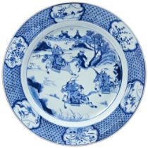 LARGE BLUE AND WHITE CHARGER KANGXI PERIOD (1662-1722) finely painted in tones of underglaze blue