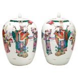 LARGE PAIR OF FAMILLE ROSE COVERED JARS QING DYNASTY, 19TH CENTURY the baluster sides painted with