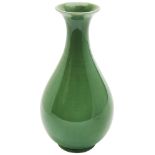 GREEN-GLAZED PEAR SHAPED VASE, YUHUCHUNPING QING DYNASTY, 19TH CENTURY covered in an apple-green