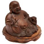 LARGE CARVED HUANGHUALI FIGURE OF A SEATED BUDDHA  QING DYNASTY, 19TH CENTURY the seated figure