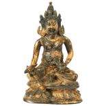 GILT BRONZE OF MAHAKALA SINO-TIBETAN, 17TH / 18TH CENTURY seated on a lotus base 15cm high