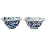 NEAR PAIR OF 'KRAAK-STYLE' BLUE AND WHITE BOWLS 17TH CENTURY the sides painted in tones of