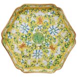 FAMILLE ROSE YELLOW-GROUND HEXAGONAL DISH GUANGXU PERIOD painted with flower blossoms, bats,