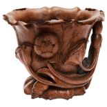 BAMBOO LIBATION CUP LATE QING DYNASTY of naturalistic form, carved as a blossoming lily 9.5cm high