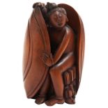 CARVED BOXWOOD FIGURE OF GUANYIN LATE QING DYNASTY modelled as the deity emerging from a clam