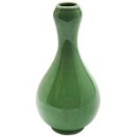 CELADON-GLAZED GARLIC MOUTH VASE QING DYNASTY, 19TH CENTURY the shaped sides covered in a pale-green
