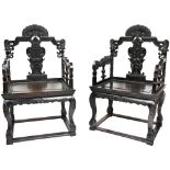 FINE PAIR OF ZITAN ARMCHAIRS LATE QING DYNASTY each elaborately carved in Rococo style with