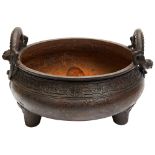 LARGE IRON TRIPOD BRAZIER LATE MING / EARLY QING DYNASTY of compressed globular form, the sides with