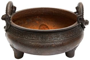 LARGE IRON TRIPOD BRAZIER LATE MING / EARLY QING DYNASTY of compressed globular form, the sides with