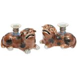 PAIR OF CHINESE EXPORT PUG DOG FORM CANDLESTICKS CIRCA 1840-60 the recumbent pups modelled in mirror