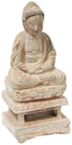 LARGE CARVED STONE FIGURE OF A BUDDHA MING DYNASTY (1368-1644) shown wearing long flowing robe