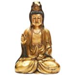 LARGE GILT-BRONZE FIGURE OF GUANYIN LATE QING DYNASTY modelled seated in dhyanasana with a raised
