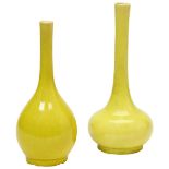 TWO YELLOW-GROUND BOTTLE VASES QING DYNASTY, 19TH CENTURY each covered in a translucent crackled