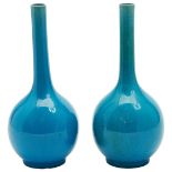 NEAR PAIR OF TURQUOISE-GLAZE BOTTLE VASES QING DYNASTY, 19TH CENTURY each covered in a translucent