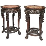 GOOD PAIR OF CARVED HUALI-WOOD STANDS QING DYNASTY, 19TH CENTURY the circular tops with inset marble