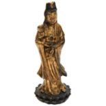 GILT BRONZE FIGURE OF GUANYIN AND CHILD 20TH CENTURY shown standing on a double lotus base 13cm high