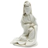 BLANC DE CHINE FIGURE OF GUANYIN QING DYNASTY, 18TH /19TH CENTURY modelled rested on one knee