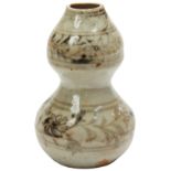 SMALL COPPER-RED DOUBLE-GOURD VASE MING DYNASTY the sides painted with bands of blossoming leafy