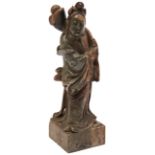 CARVED SOAPSTONE FIGURE OF GUANYIN LATE QING DYNASTY raised on a square base 18cm high