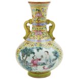 GOOD YELLOW-GROUND FAMILLE ROSE VASE QING DYNASTY, 19TH CENTURY the sides finely painted with two