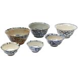 SIX CHINESE BLUE AND WHITE BOWLS LATE MING / TRASITIONAL PERIOD each painted in tones of