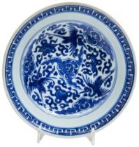 BLUE AND WHITE 'FLYING-CRANES' DISH KANGXI SIX CHARACTER MARK AND OF THE PERIOD  painted in tones of