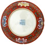 FINE CORAL-RED 'PEONY' SAUCER DISH QIANLONG SEAL MARK IN BLUE AND OF THE PERIOD the sides painted