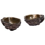 PAIR OF HUANGHUALI LIBATION CUPS 17TH / 18TH CENTURY of typical form, each naturalistic carved in