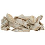 A JAPANESE 19TH CENTURY IVORY OKIMONO OF A RECLINING MALE FIGURE, poised with a tea bowl in his