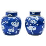 SMALL PAIR OF BLUE AND WHITE 'PRUNUS AND CRACKED -ICE' GINGER JARS QING DYNASTY