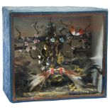 SMALL CHINESE EXPORT DIORAMA LATE QING DYNASTY depicting two fighting cockerels within a flowering