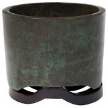 BRONZE TRIPOD CENSER 20TH CENTURY  of cylindrical form, raised on a fitted hardwood stand, seal mark